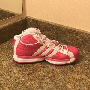 Pink adidas basketball shoes.